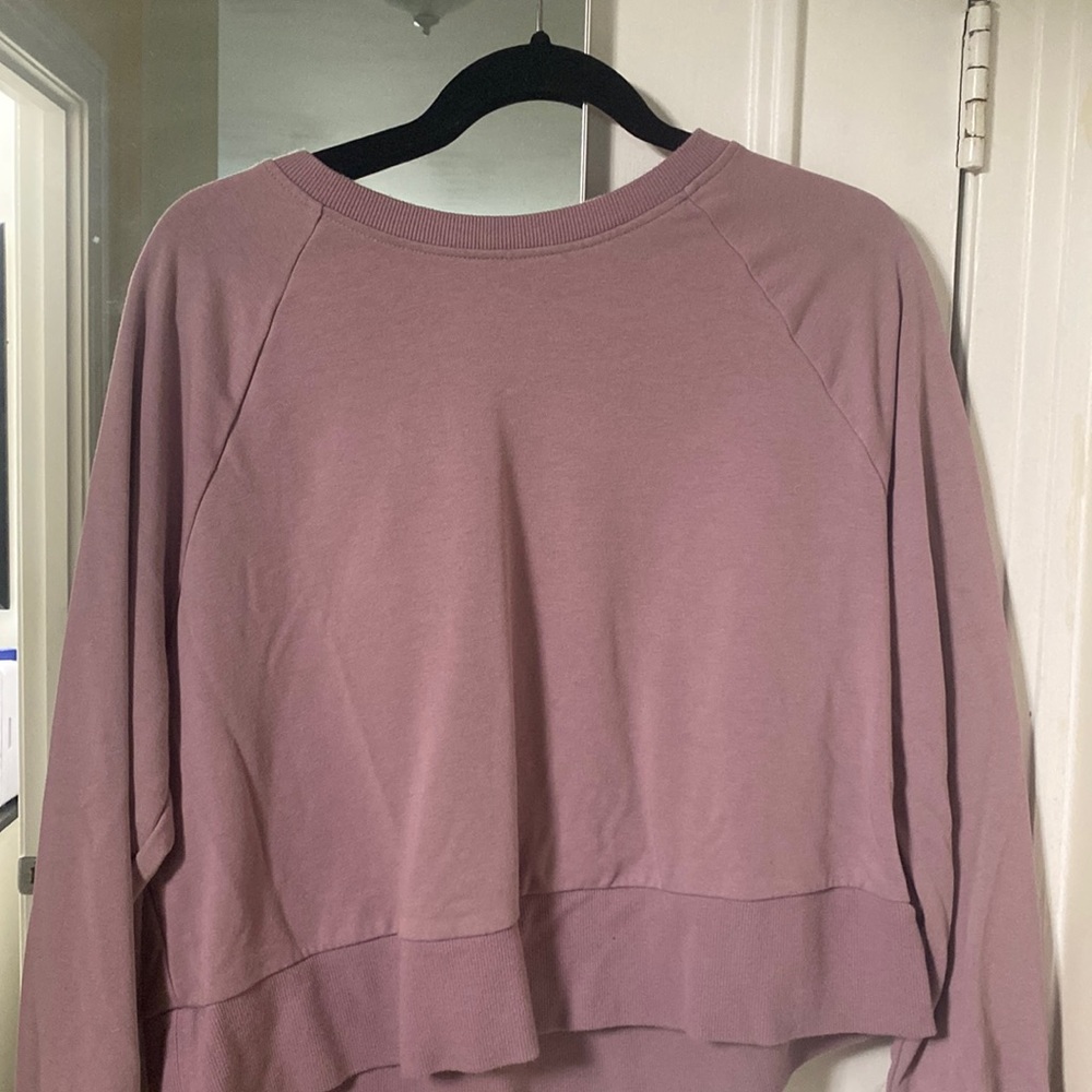 Pink crewneck athletic sweatshirt. Used 2 times